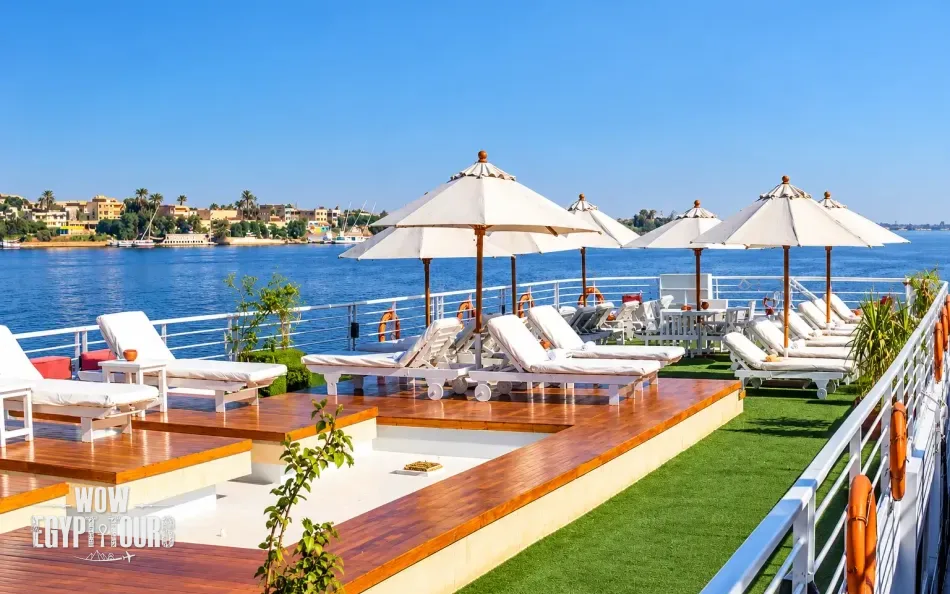 Outdoor seating and sun loungers on the sun deck of Salima Nile Cruise