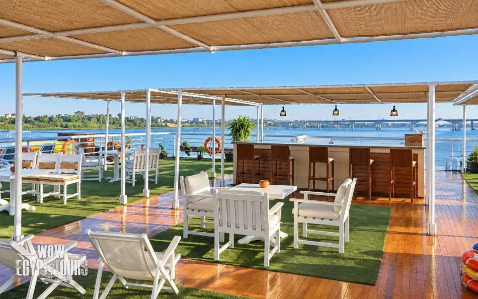 Outdoor seating and loungers on the sun deck of Jamila Nile Cruise