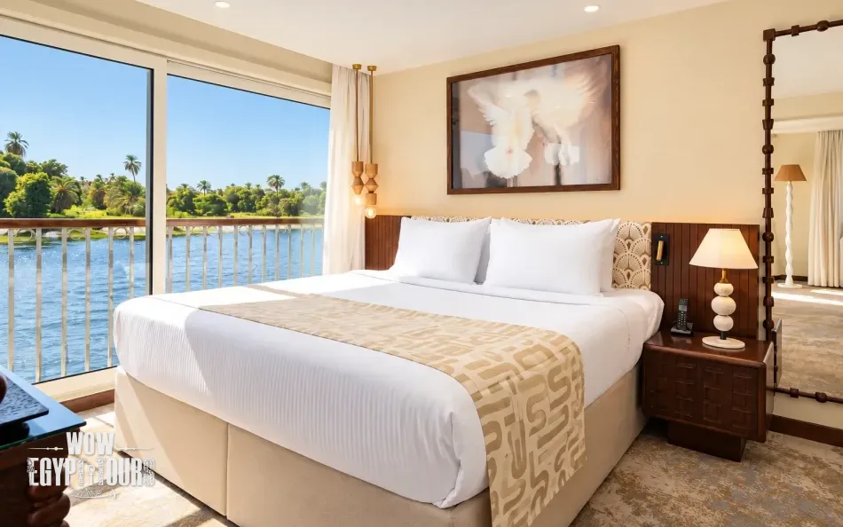 Double cabin with a large bed aboard Tulip Nile Cruise