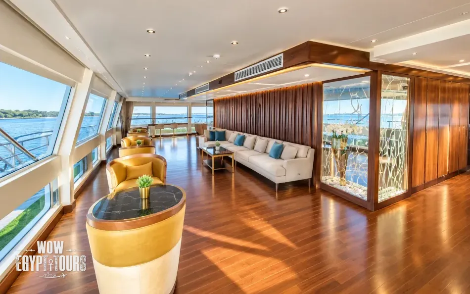 Panoramic lounge with Nile River views aboard Concerto II Nile Cruise