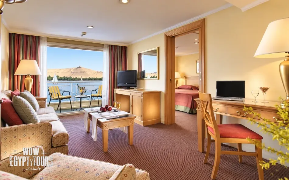Interior view of a spacious suite aboard Jaz Crown Emperor Nile Cruise