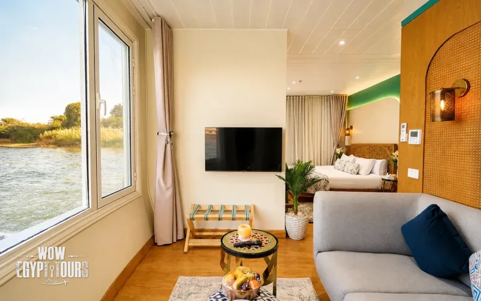 Suite panoramic interior with seating area aboard Nayera Dahabiya Nile Cruise