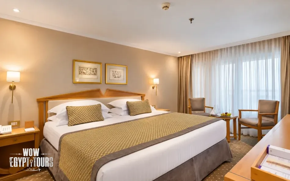 Double cabin with a large bed aboard Steigenberger Regency Nile Cruise
