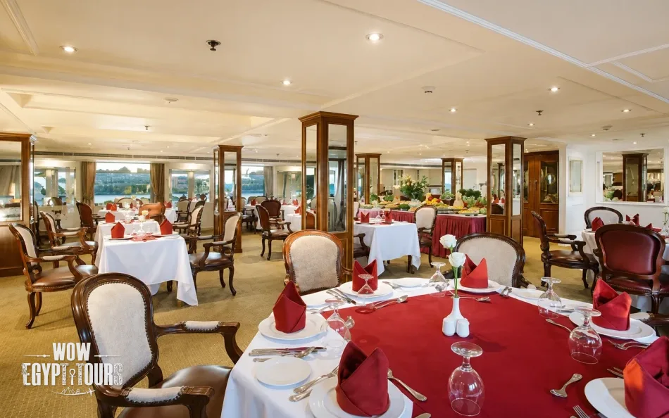 Restaurant with prepared dining tables aboard La Traviata Nile Cruise