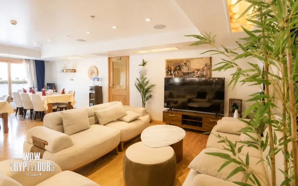Indoor salon with sofa seating aboard Gardenia Dahabiya Nile Cruise