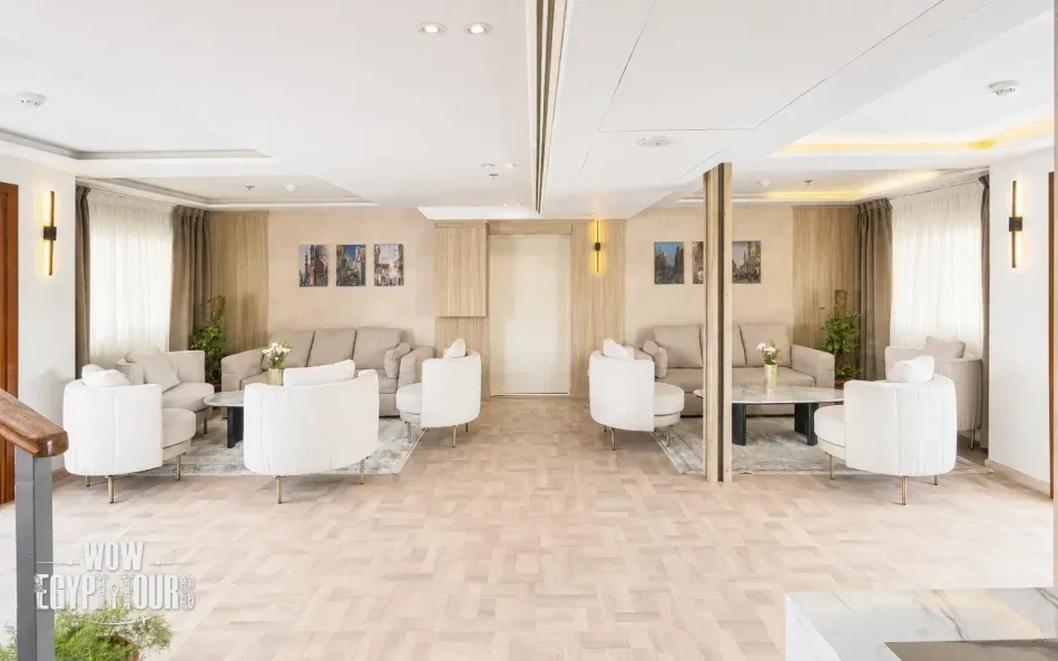 Indoor salon with seating aboard Merit Dahabiya Nile Cruise