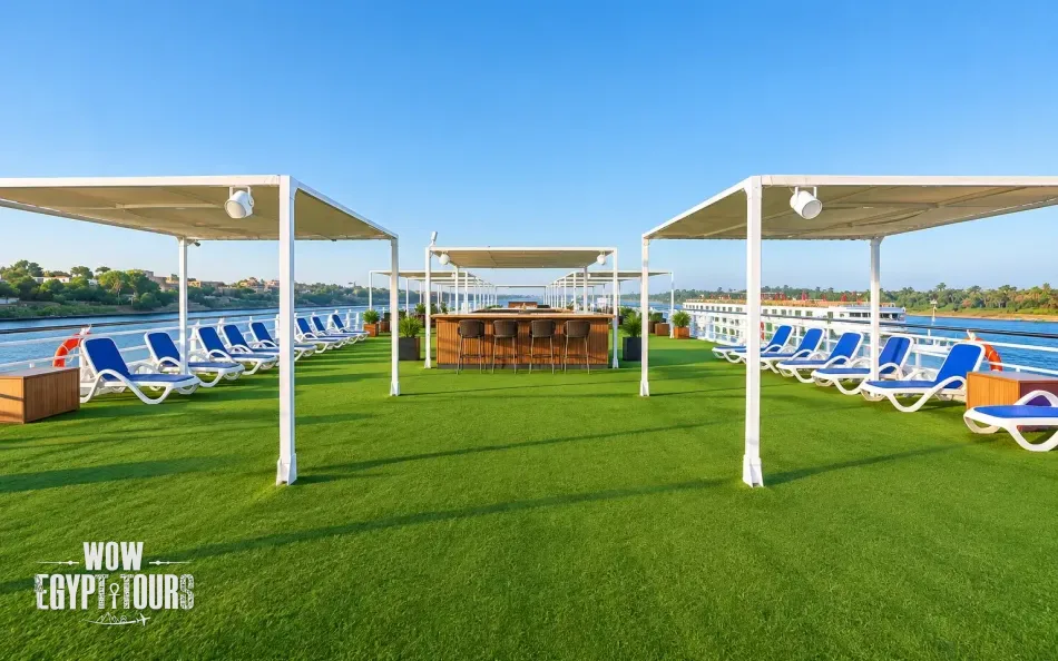 Outdoor seating and sun loungers on the sun deck of Nile Story Nile Cruise