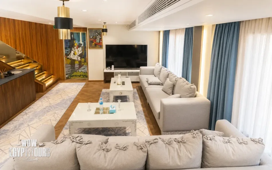 Indoor salon with sofa seating aboard Iris Dahabiya Nile Cruise