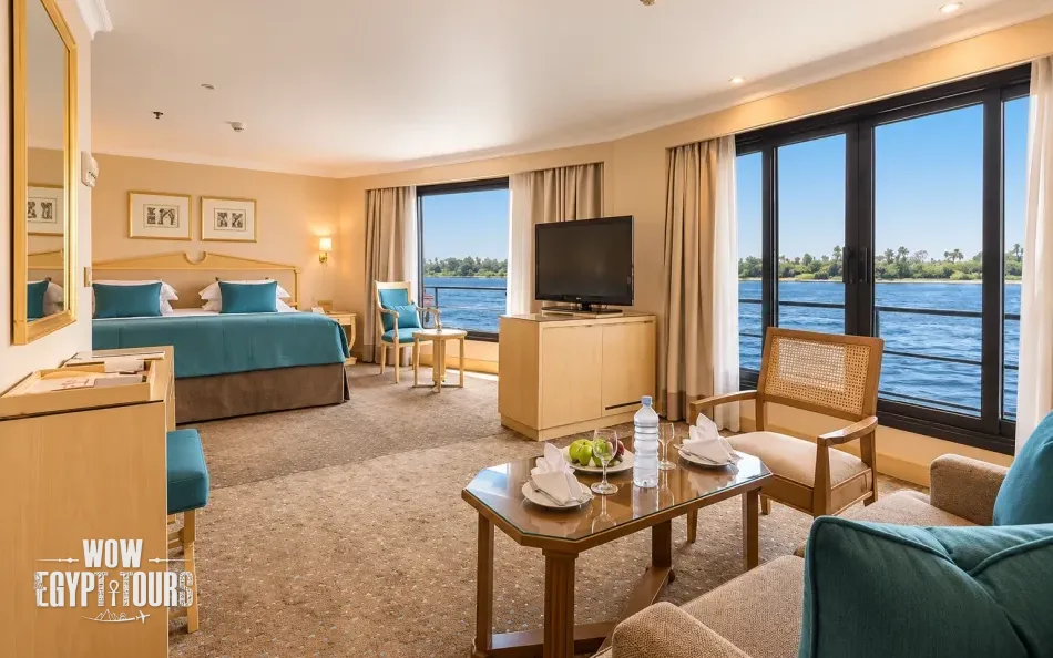 Spacious suite with seating area aboard Steigenberger Regency Nile Cruise