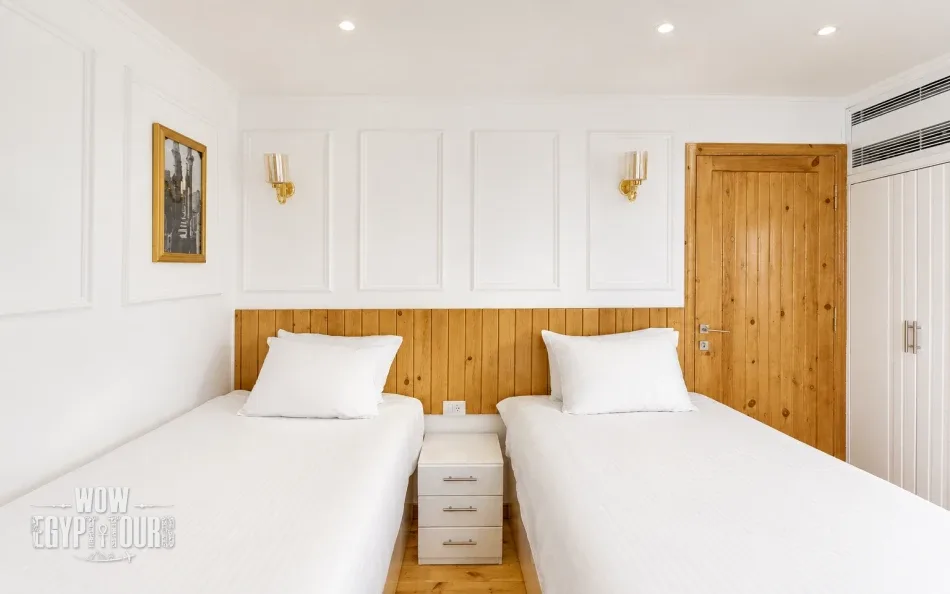 Twin cabin with two separate beds aboard Fatima Dahabiya Nile Cruise