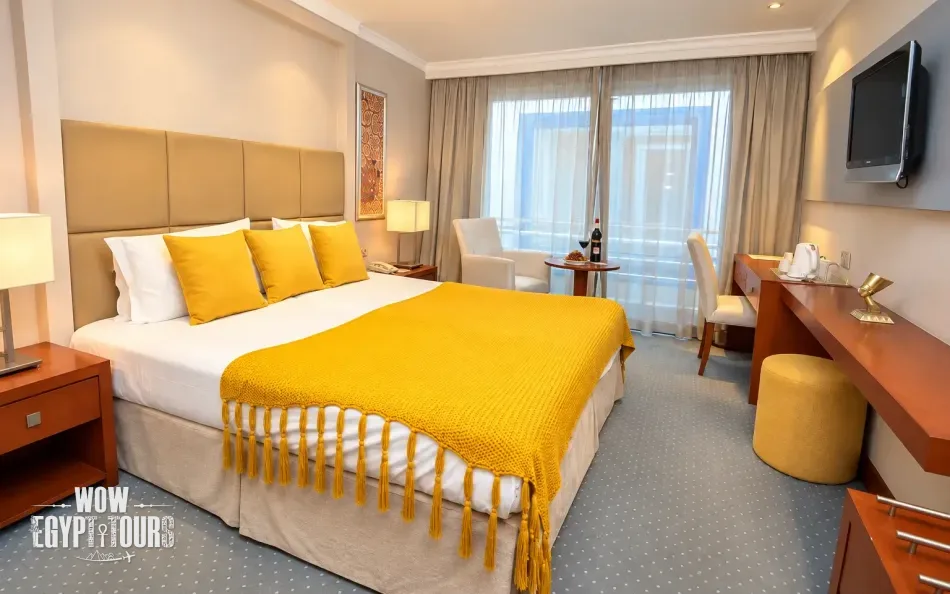 Double cabin with a large bed aboard Jamila Nile Cruise