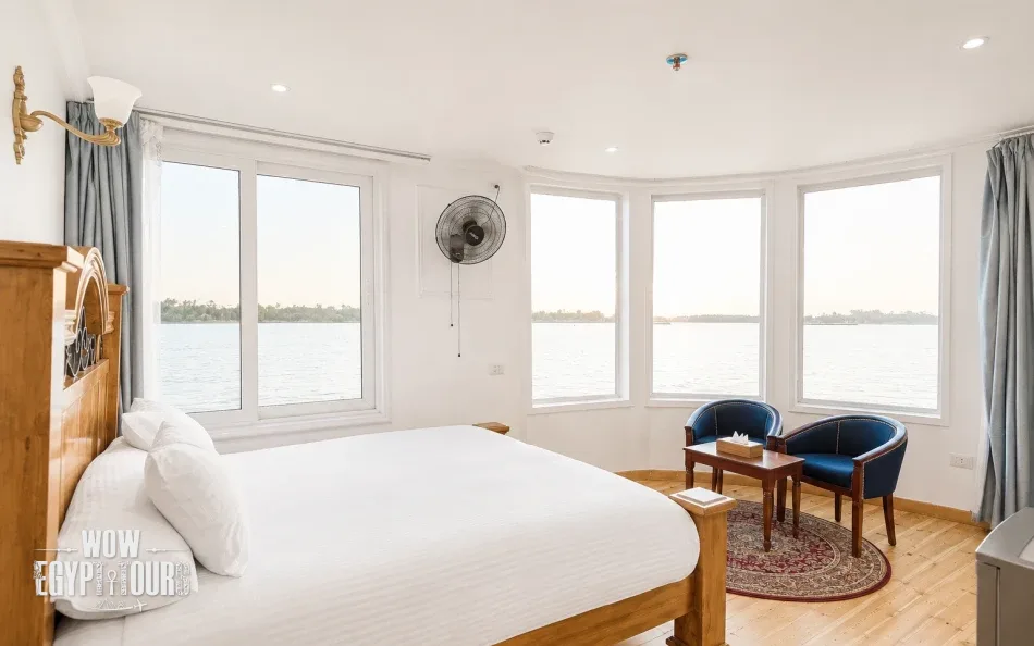 Spacious suite with Nile River views aboard Fatima Dahabiya Nile Cruise