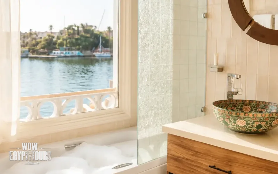 Bathroom with Nile River views aboard Nayera Dahabiya Nile Cruise