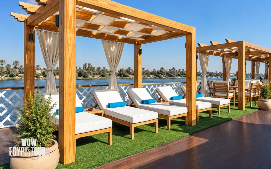Shaded seating and loungers on the sun deck of Merit II Dahabiya Nile Cruise