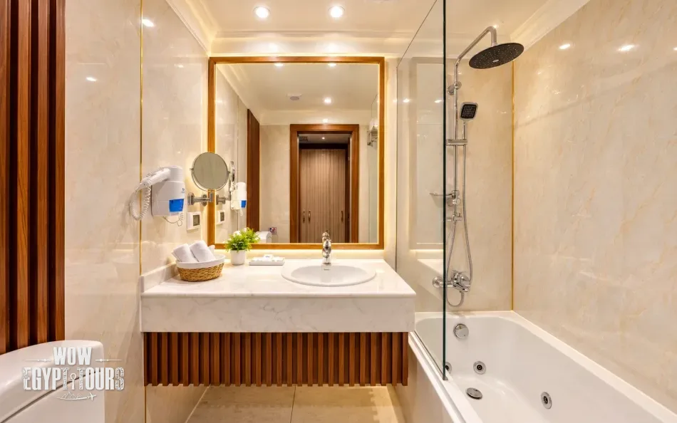 Suite bathroom with vanity and bathtub aboard Chateau Lafayette Nile Cruise