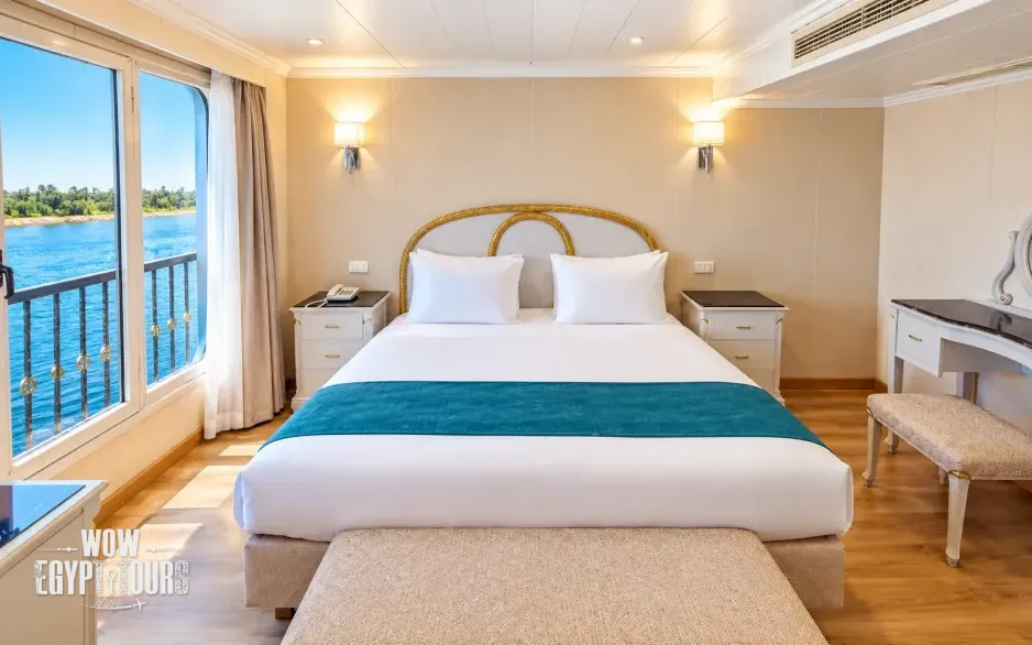 Double cabin with a large bed aboard Nile Quest Nile Cruise