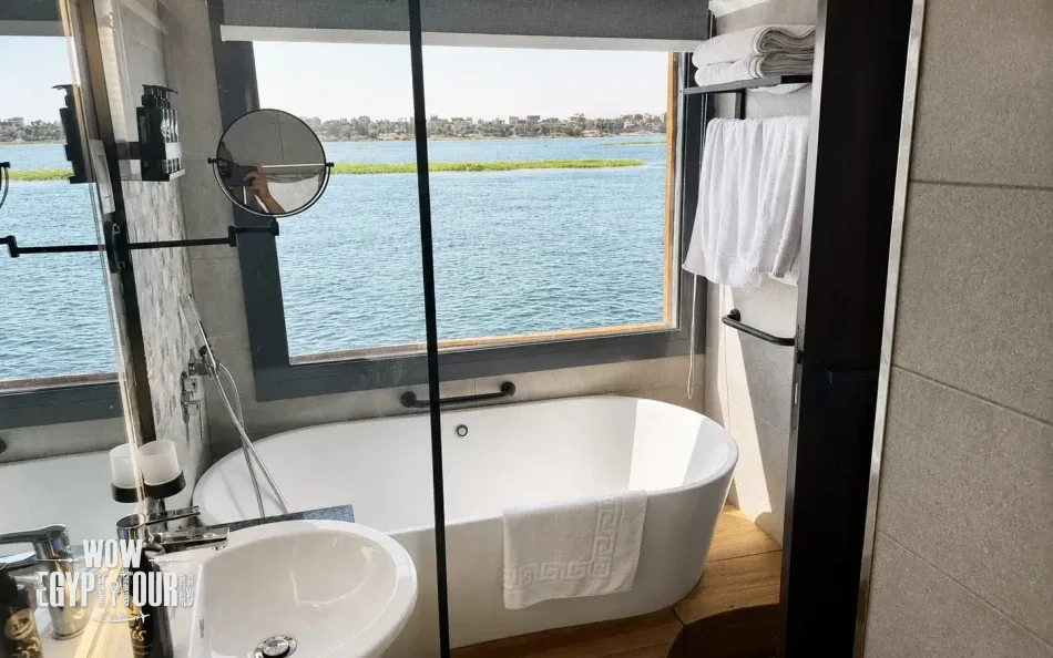 Suite bathroom with bathtub aboard Iris Dahabiya Nile Cruise