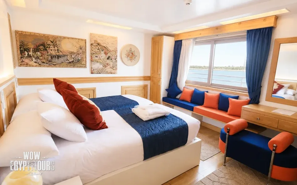 Double cabin with a large bed aboard Gardenia Dahabiya Nile Cruise