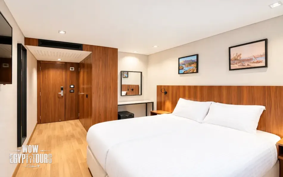 Double cabin with a large bed aboard Nile Plaza Nile Cruise