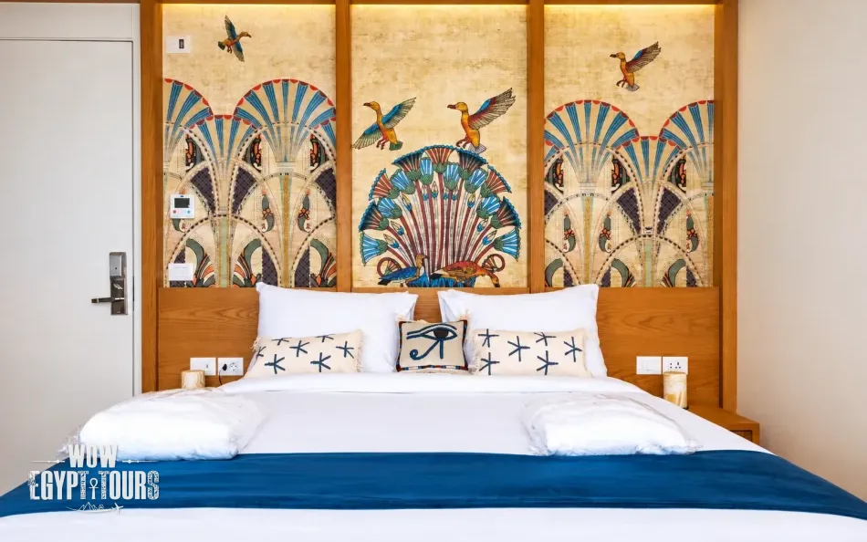 Double cabin with a large bed aboard Per Ba Merkaba Dahabiya Nile Cruise