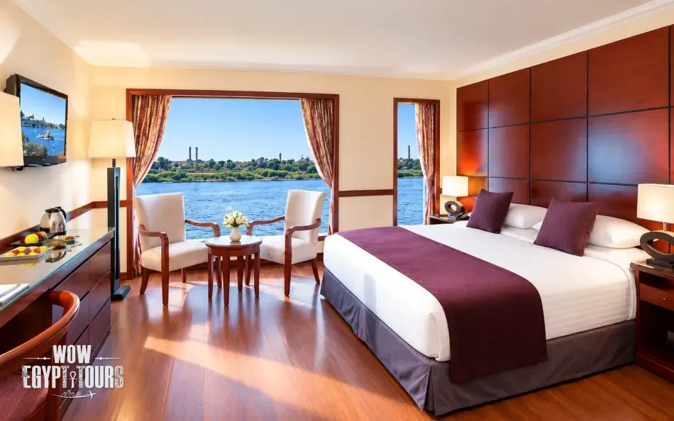Double cabin with a large bed aboard Amwaj Nile Cruise