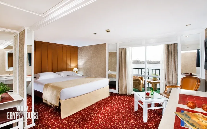 Double cabin with seating area aboard La Traviata Nile Cruise