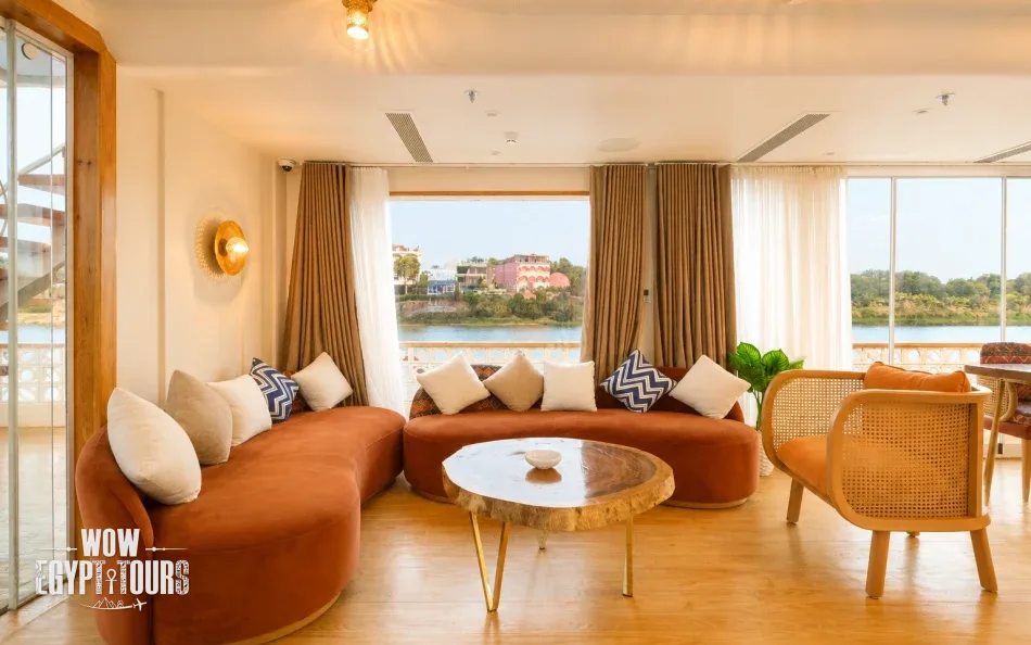 Lounge interior with sofa seating aboard Nayera Dahabiya Nile Cruise