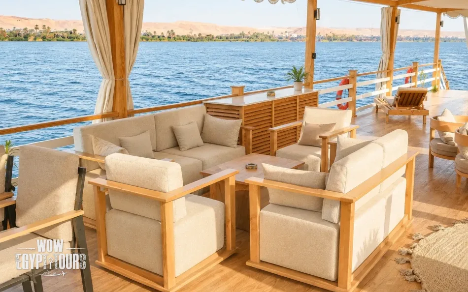 Shaded seating area on the sun deck of Swan Dahabiya Nile Cruise