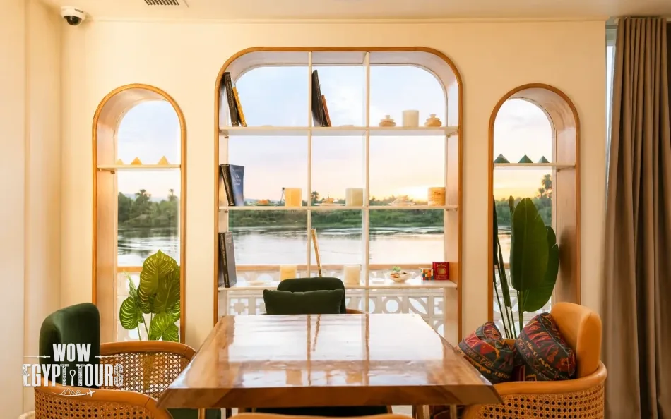 Indoor salon with Nile River views aboard Nayera Dahabiya Nile Cruise
