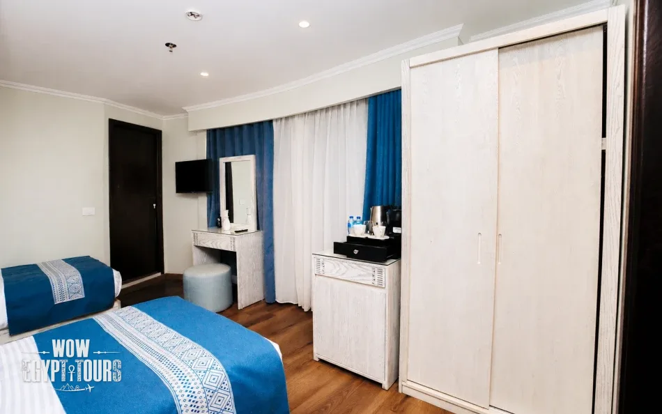 Twin cabin with two separate beds aboard Iris Dahabiya Nile Cruise