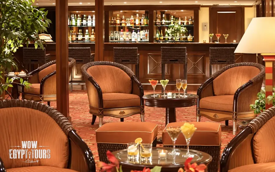 Lounge and bar seating area aboard Jaz Crown Empress Nile Cruise