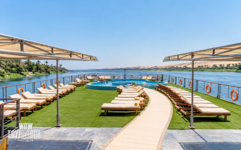 Outdoor seating and sun loungers on the sun deck of Nile Premium Nile Cruise