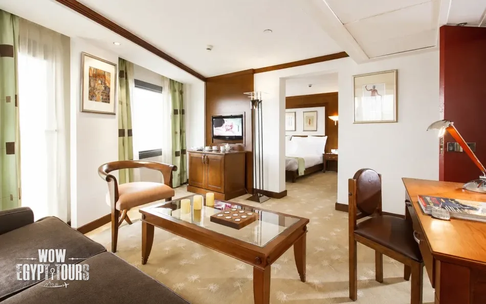 Spacious suite with a seating area aboard Nile Goddess Nile Cruise