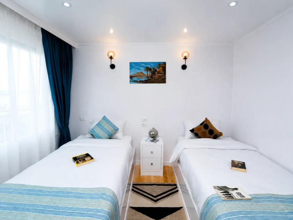 Twin cabin with two separate beds aboard Turquoise Dahabiya Nile Cruise