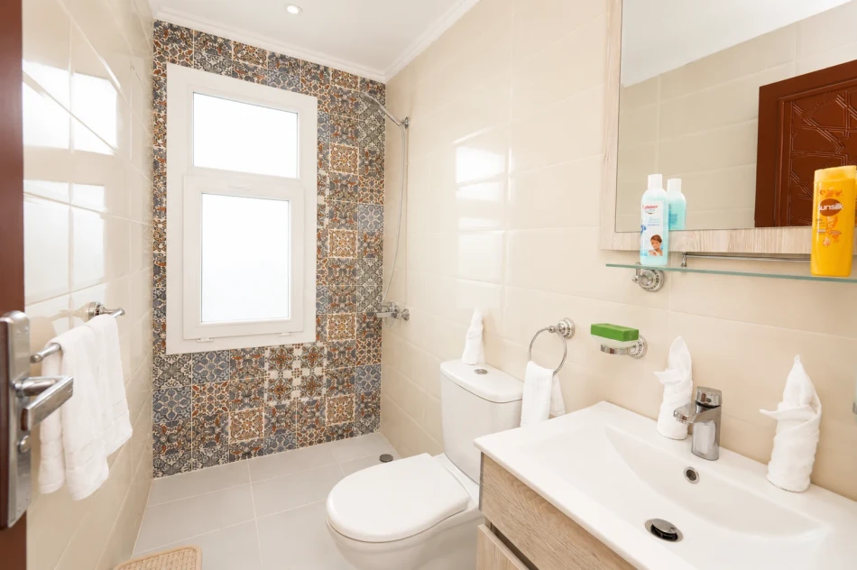 Private cabin bathroom aboard Turquoise Dahabiya Nile Cruise