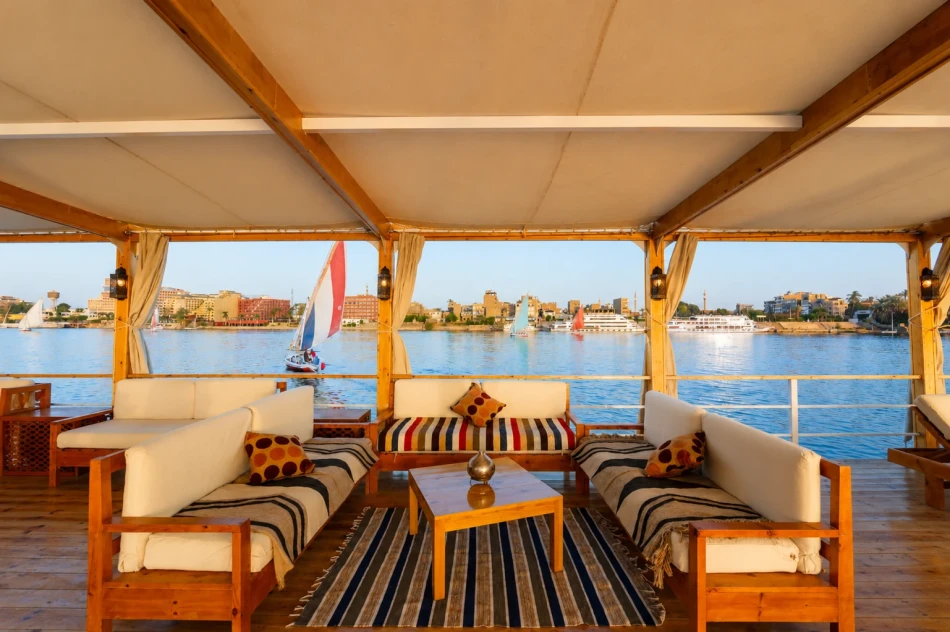 Shaded outdoor lounge on the sun deck of Turquoise Dahabiya Nile Cruise