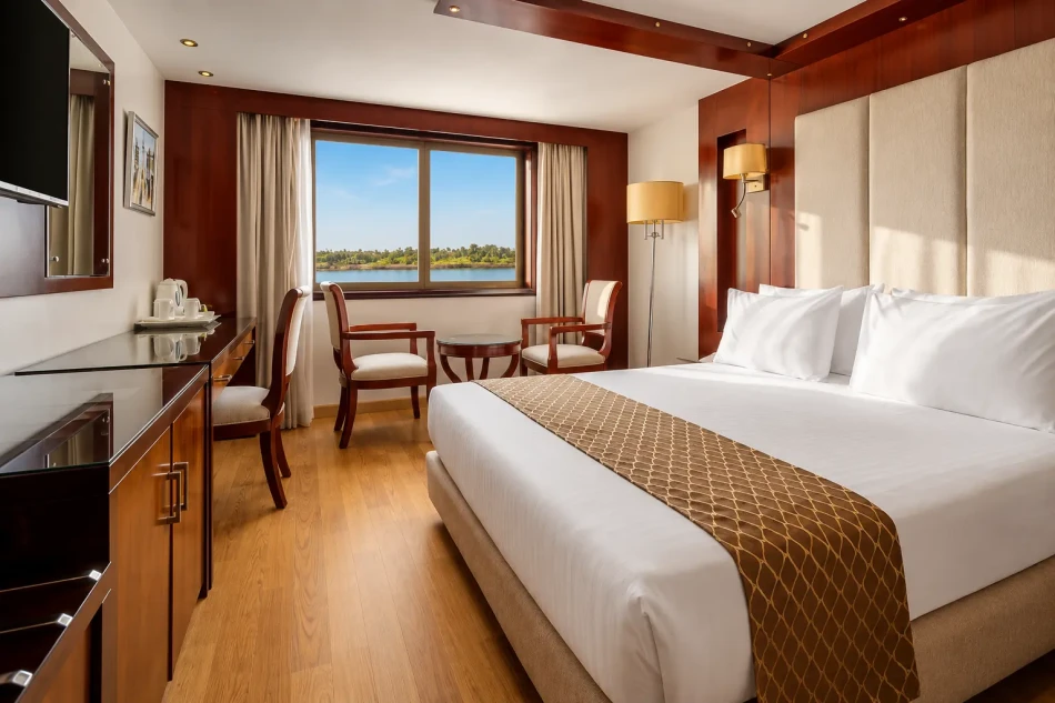 Double cabin with a large bed aboard Blue Shadow Nile Cruise