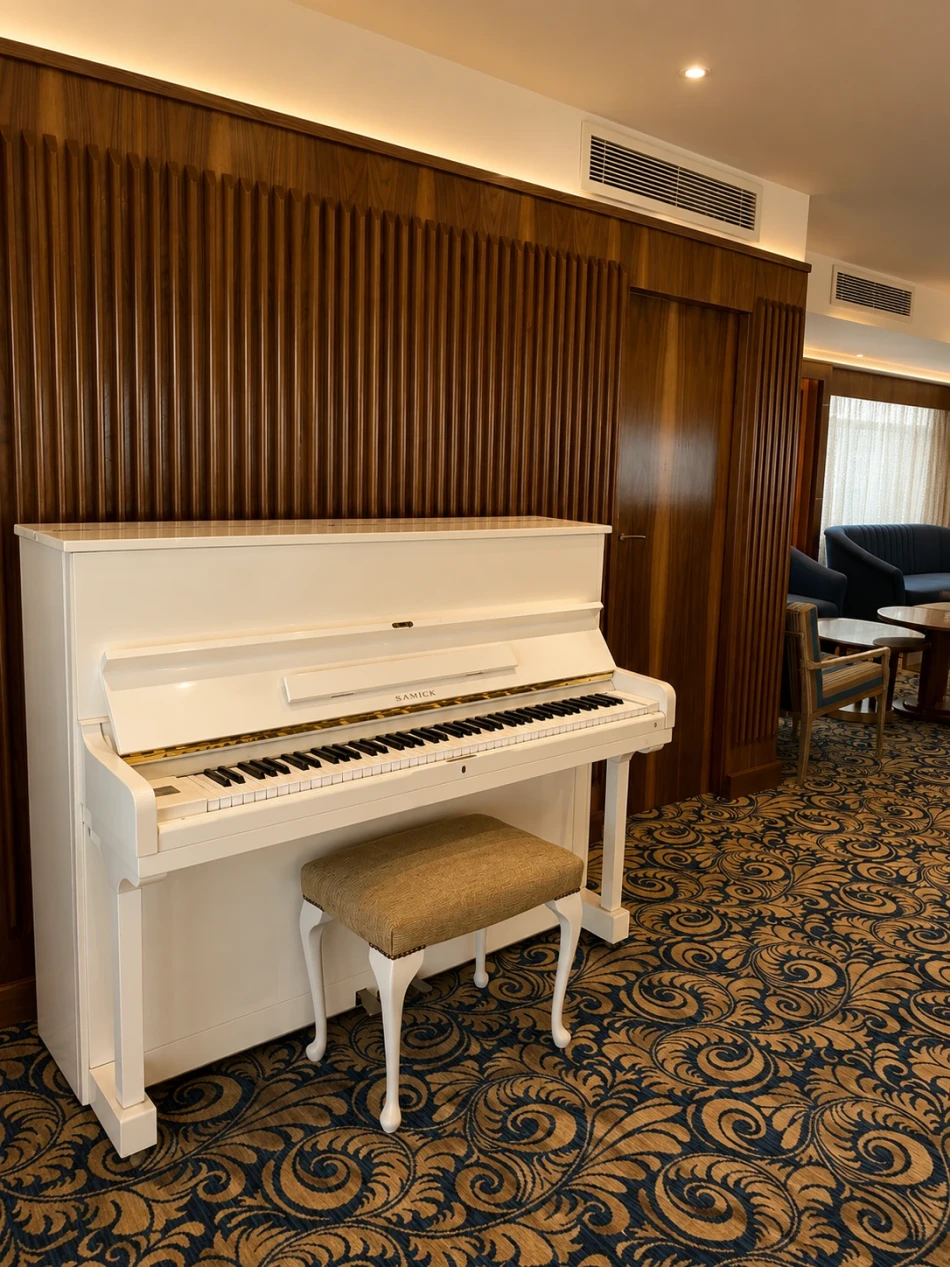 Piano in the lounge aboard Radamis I Nile Cruise