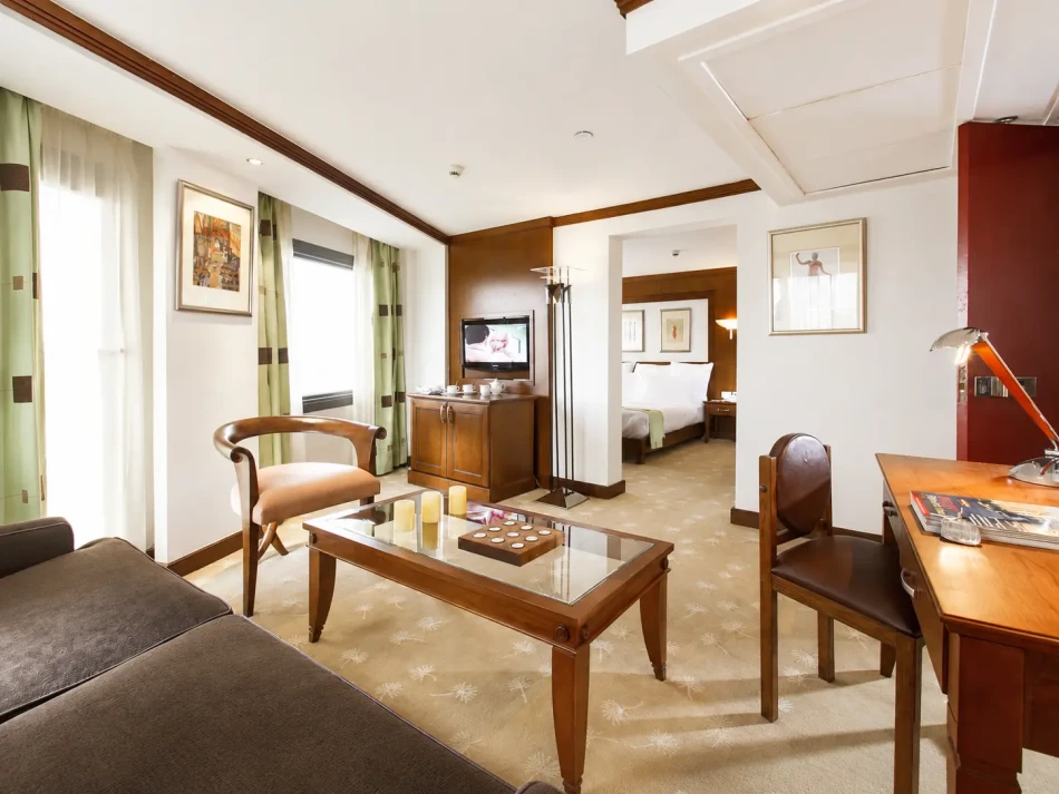 Spacious suite with a seating area aboard Nile Goddess Nile Cruise