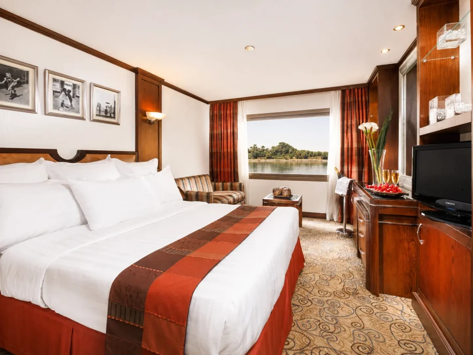 Double cabin with a large bed aboard Nile Goddess Nile Cruise