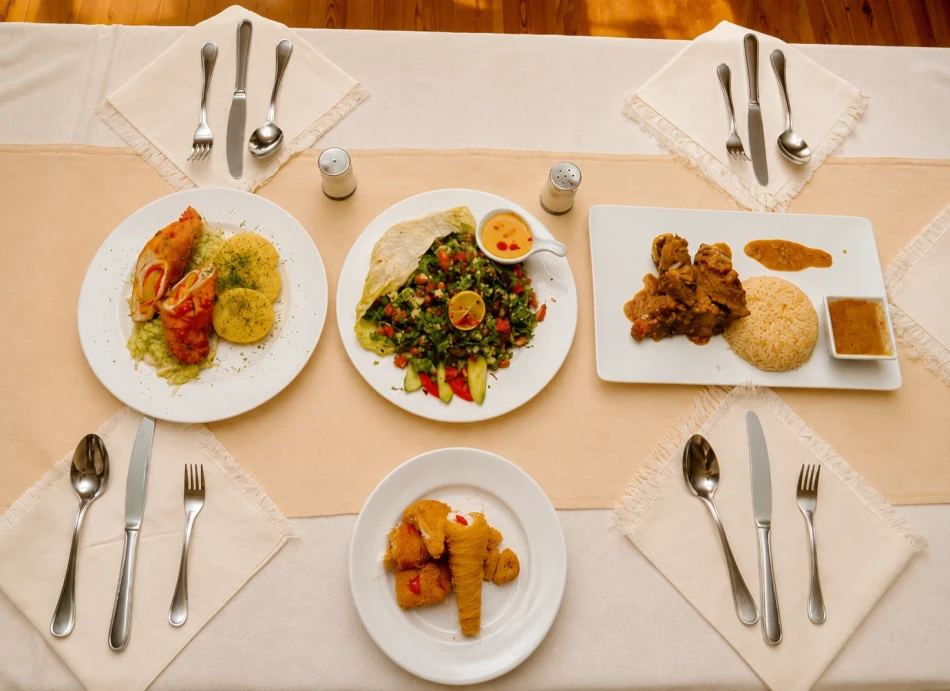 Dining table with meals served aboard Turquoise Dahabiya Nile Cruise