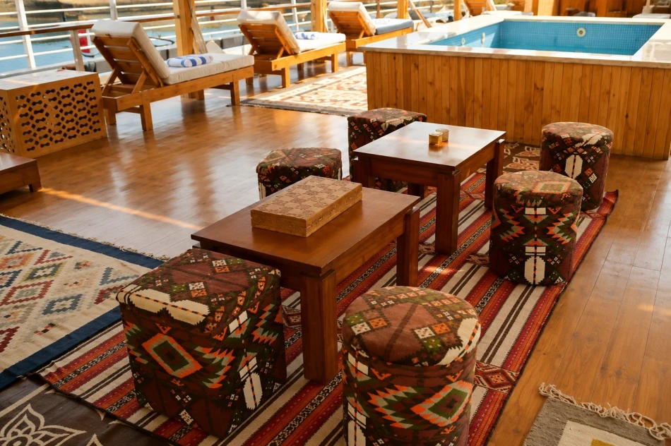 Outdoor seating area on the sun deck of Turquoise Dahabiya Nile Cruise
