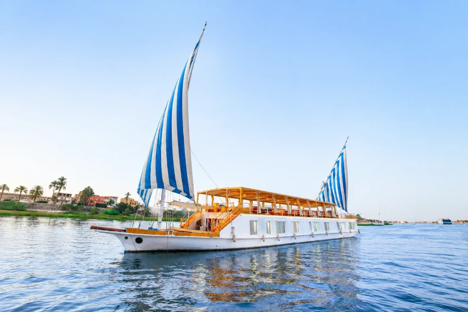 Turquoise Dahabiya Nile River Cruise sailing on the Nile