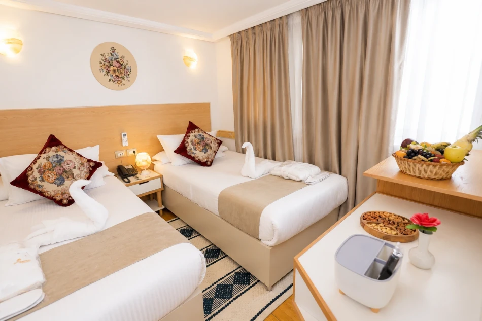 Twin cabin with two separate beds aboard Gorgonia Dahabiya Nile Cruise