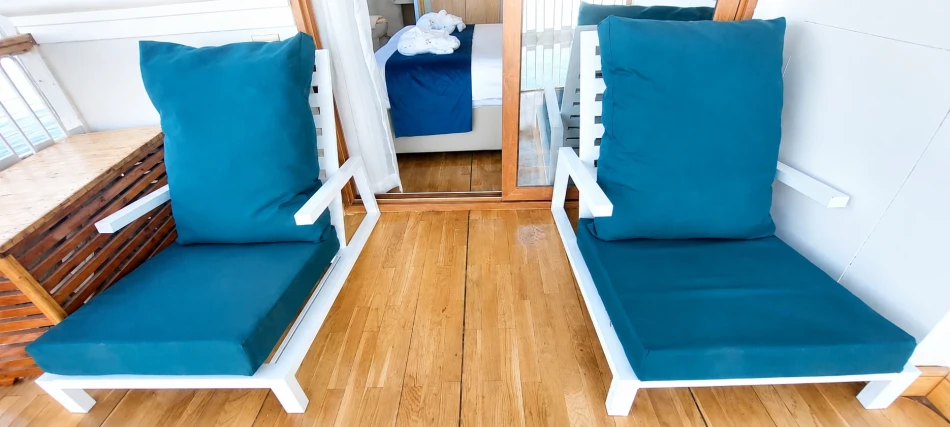 Private suite balcony with Nile River views aboard Gorgonia Dahabiya Nile Cruise