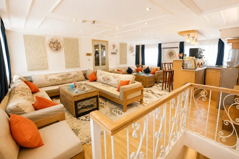 Indoor salon with sofa seating aboard Gorgonia Dahabiya Nile Cruise