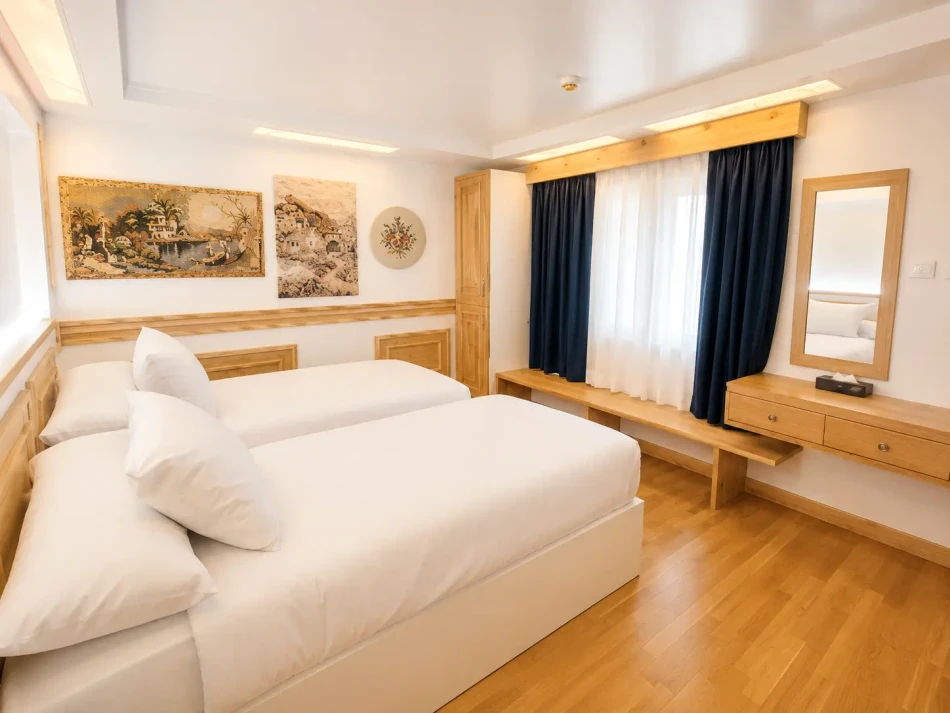 Twin cabin with two separate beds aboard Gardenia Dahabiya Nile Cruise