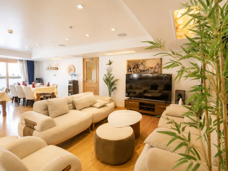 Indoor salon with sofa seating aboard Gardenia Dahabiya Nile Cruise