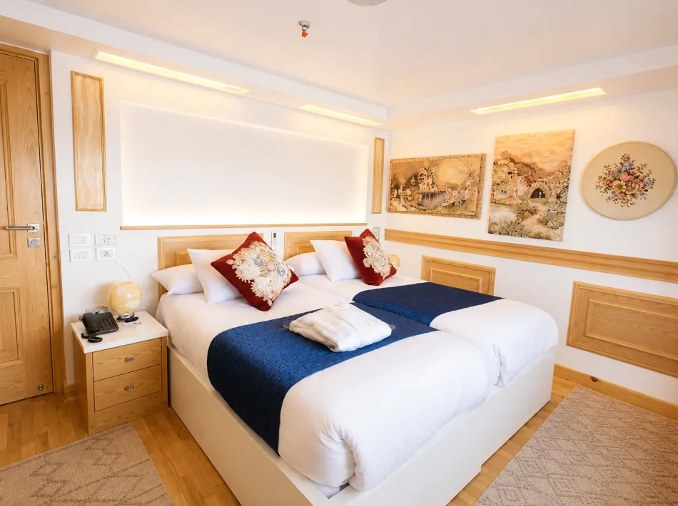 Interior view of a double cabin aboard Gardenia Dahabiya Nile Cruise