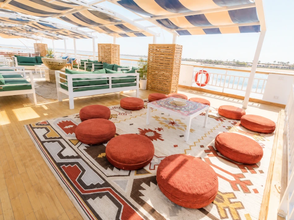 Open-air dining area on the sun deck of Gardenia Dahabiya Nile Cruise